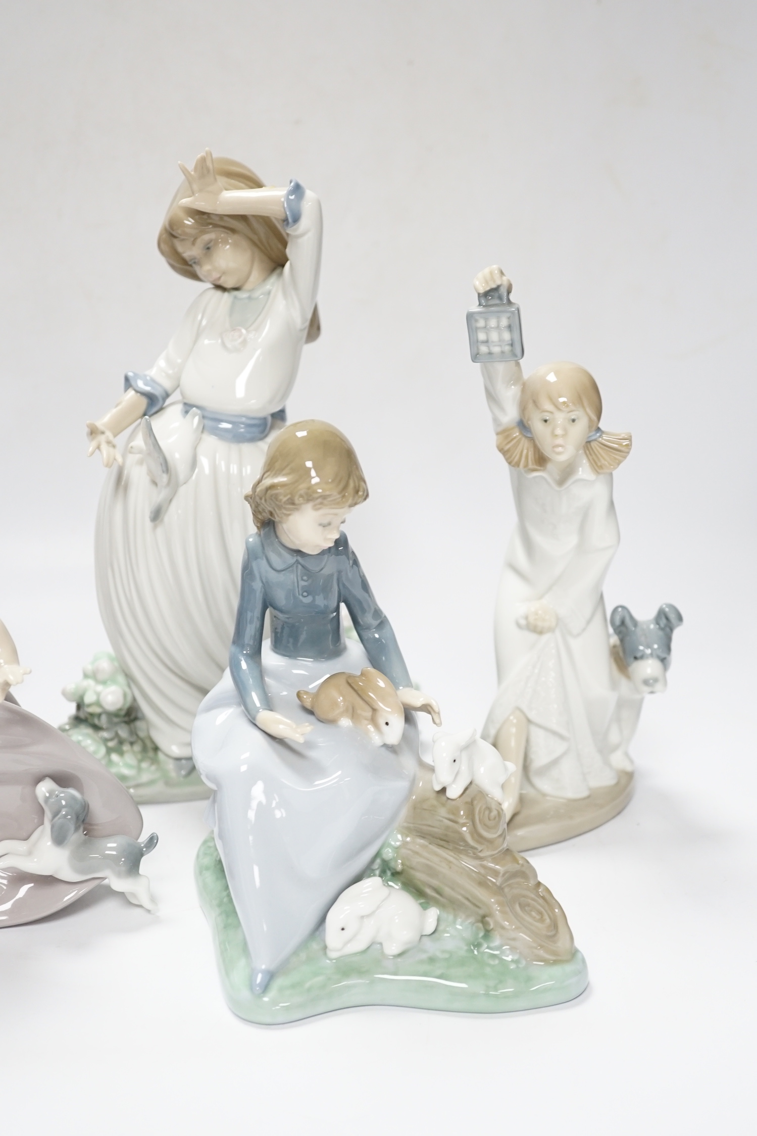 Six Nao figure groups of children playing with animals, (two boxed), largest 25cm high